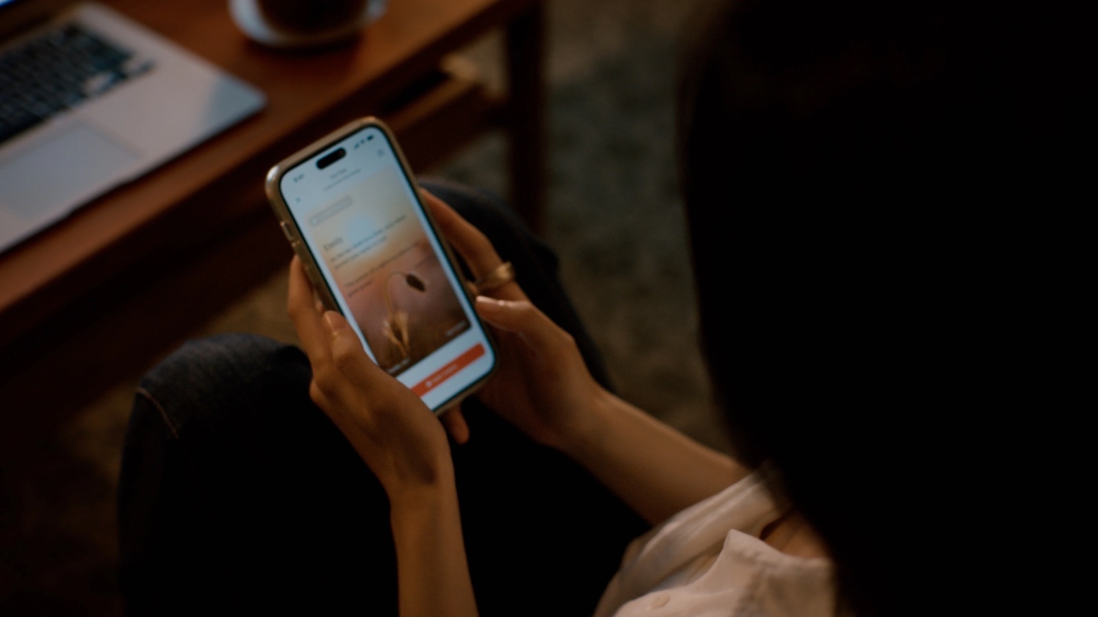 A person viewing daily wellness insights in the Glorify App